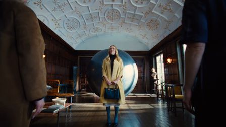 Scarlett Johannson practices magic for Prada
