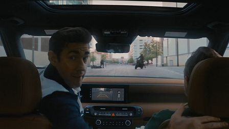 John Krasinski bonds with his new Hyundai